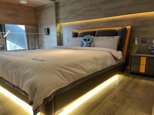 מיטה או מיטות בחדר ב-Zac Homestay
