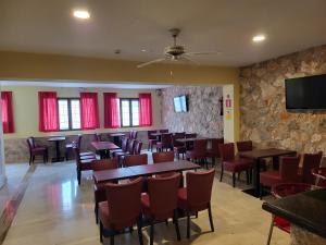 Restoran ili neka druga zalogajnica u objektu Das Hostal