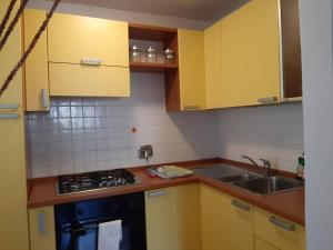 Кухня или мини-кухня в Villa Cristina Apartment
