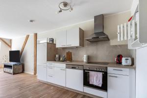 Kuchyň nebo kuchyňský kout v ubytování Denkerhof Ferienwohnung Südsonne