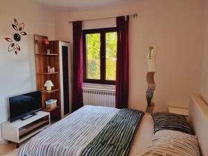 Posteľ alebo postele v izbe v ubytovaní Studio TRIPLE M Rovinj