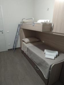 Posteľ alebo postele v izbe v ubytovaní Casa Violetta