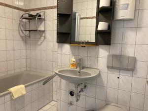 Ein Badezimmer in der Unterkunft Apartmentcenter Koblenz