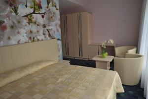 Postel nebo postele na pokoji v ubytování Mineral SPA Draugystė