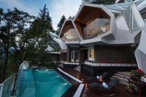 The swimming pool at or close to Tree of Life Eila Art Hotel, Manali