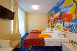 Postel nebo postele na pokoji v ubytování Mineral SPA Draugystė