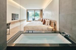 Cama ou camas em um quarto em Muni Kyoto