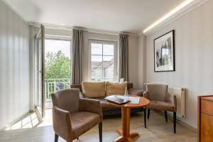 Posezení v ubytování Hotel Am Uenglinger Tor