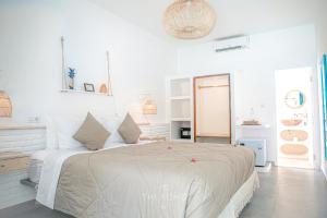 Voodi või voodid majutusasutuse The Koho Air Hotel toas