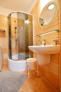 Łazienka w obiekcie Apartamenty NAVIGATOR-Rezydencja Portowa 14