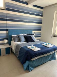 A bed or beds in a room at Interno7 Rooms