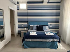 A bed or beds in a room at Interno7 Rooms