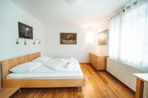 מיטה או מיטות בחדר ב-House Planica