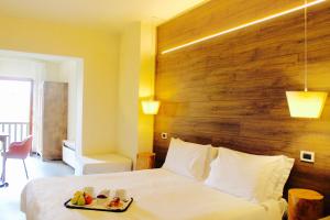 Postel nebo postele na pokoji v ubytování Hotel Miramonti Family & SPA