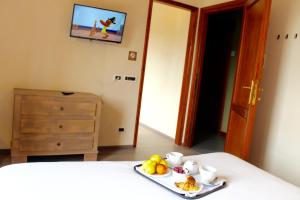Postel nebo postele na pokoji v ubytování Hotel Miramonti Family & SPA