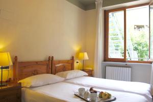 Postel nebo postele na pokoji v ubytování Hotel Miramonti Family & SPA