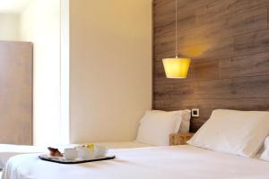 Postel nebo postele na pokoji v ubytování Hotel Miramonti Family & SPA
