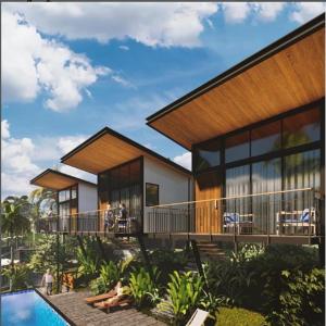 Miracle Hotel and Resorts في كوجيكود: تقديم منزل به مسبح