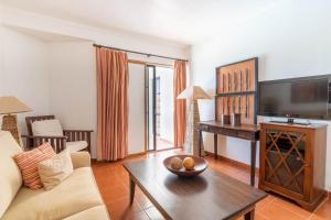 TV a/nebo společenská místnost v ubytování Hotel da Aldeia - Adults Only