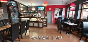 Un restaurant sau alt loc unde se poate mânca la Hotel Karlštejn & SPA
