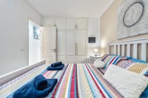 Posteľ alebo postele v izbe v ubytovaní Casa complesso Tanife Yumbo + 12 fotografií