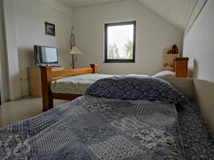เตียงในห้องที่ Vila Hajdi Planina Tara