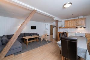 Kuchyň nebo kuchyňský kout v ubytování Nermo Hotel & Apartments