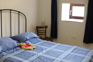 Postel nebo postele na pokoji v ubytování Le Pressoir