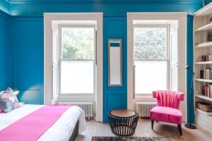 Voodi või voodid majutusasutuse 4 Berkeley Square I Your Apartment toas