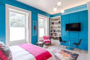 Televiisor ja/või meelelahutuskeskus majutusasutuses 4 Berkeley Square I Your Apartment