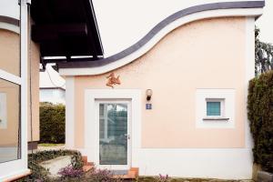 a house with a star on the side of it at Sweet Sissi in Ljubljana +4 photos