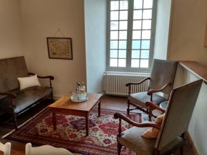 Posezení v ubytování Chateau de Balsac