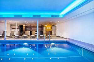 Bazén v ubytování H+ Hotel & SPA Engelberg nebo v jeho okolí