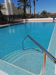 The swimming pool at or close to KC home abroad panoramic sea view