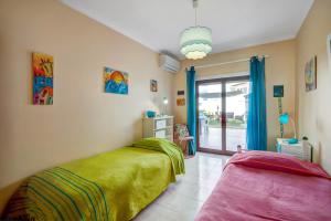 Ένα ή περισσότερα κρεβάτια σε δωμάτιο στο Apartamento beira mar