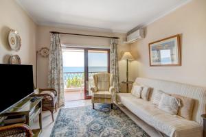 Μια τηλεόραση ή/και κέντρο ψυχαγωγίας στο Apartamento beira mar