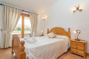 Posteľ alebo postele v izbe v ubytovaní Els Pins -Port d'Alcudia-