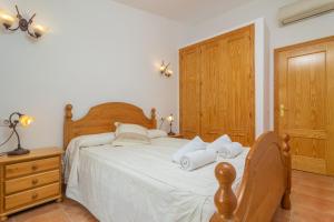 Posteľ alebo postele v izbe v ubytovaní Els Pins -Port d'Alcudia-