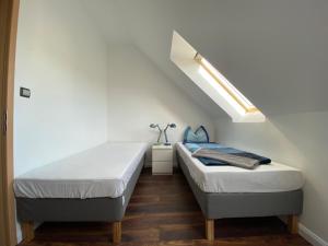 Posteľ alebo postele v izbe v ubytovaní 2 bedroom 107 m2 loft with balcony