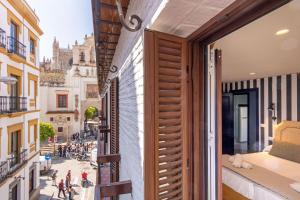 Posteľ alebo postele v izbe v ubytovaní Ohliving Giralda