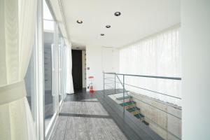 Foto sihtkohas Futo asuva majutusasutuse ファミーユ大室Ⅱ galeriist