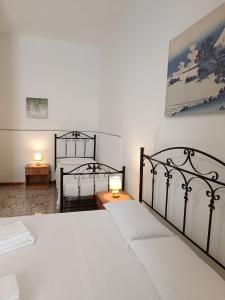 A bed or beds in a room at Casa Il Pesco