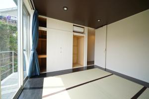 Foto sihtkohas Futo asuva majutusasutuse ファミーユ大室Ⅱ galeriist