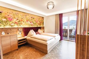 Ein Bett oder Betten in einem Zimmer der Unterkunft Haus Bader