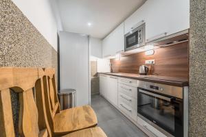 Kuchyň nebo kuchyňský kout v ubytování Hostel ONE