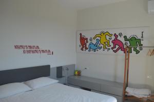 A bed or beds in a room at Casa Tua