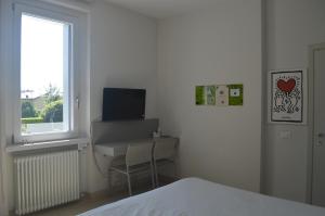 A television and/or entertainment centre at Casa Tua