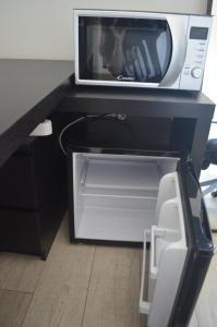 A television and/or entertainment centre at Casa Tua