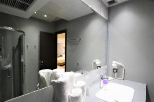 A bathroom at Aiolos Apartments Suites Ermou 64 Monastiraki Plaka 2nd Floor
