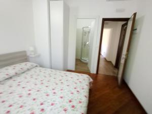 Postel nebo postele na pokoji v ubytování Agriturismo U muinettu